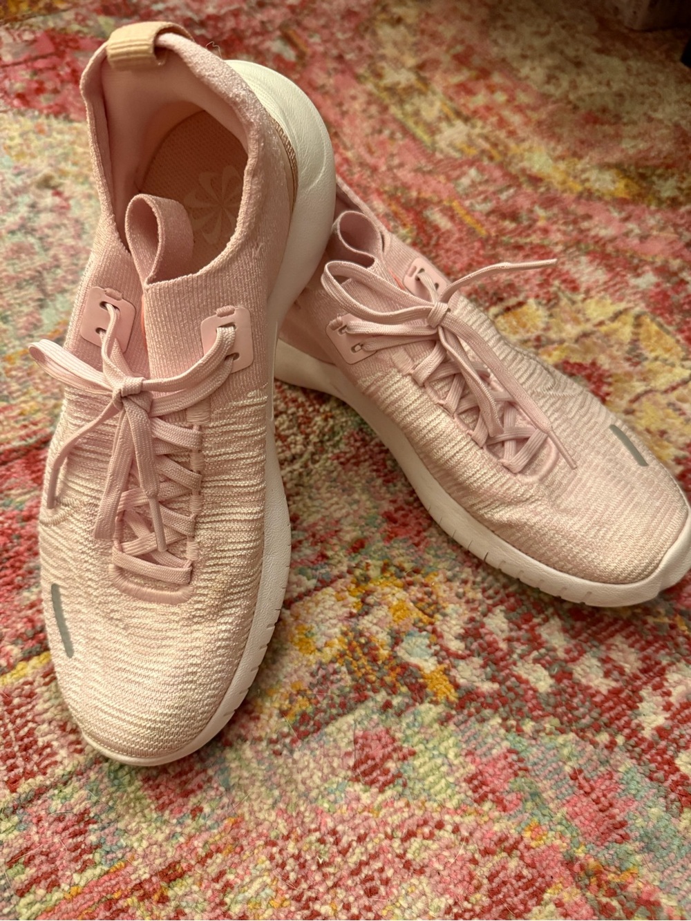 Nike Women’s Light Pink Slip-On Sneakers
